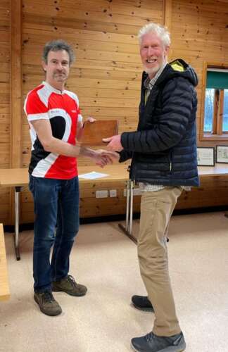 Dil Wetherill receives the Veteran Mens WAGAL trophy